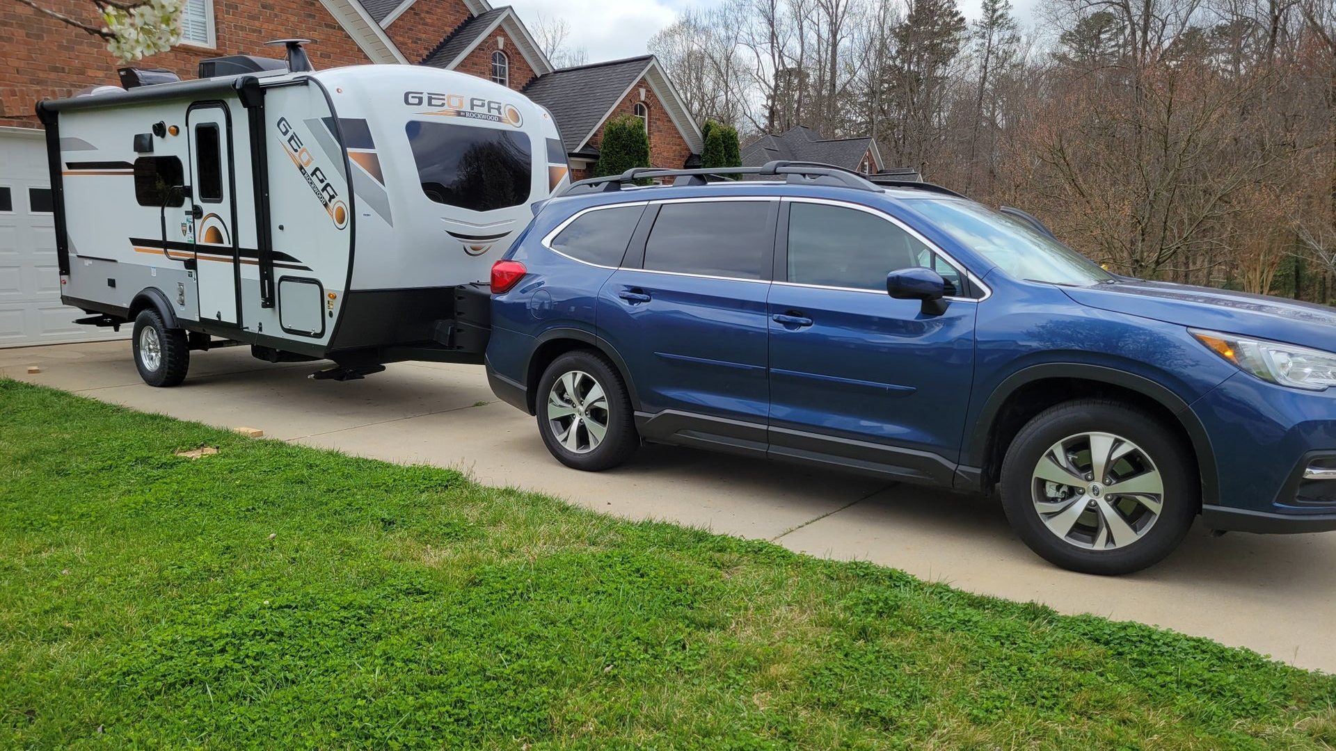 geo pro being towed by small suv