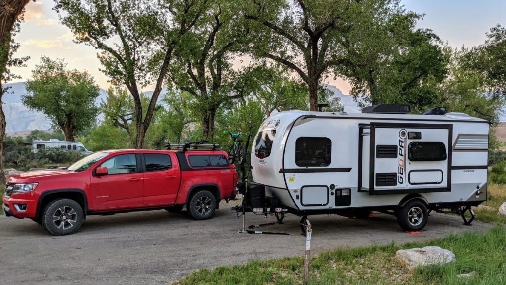 Rockwood Geo Pro parked beside small red truck