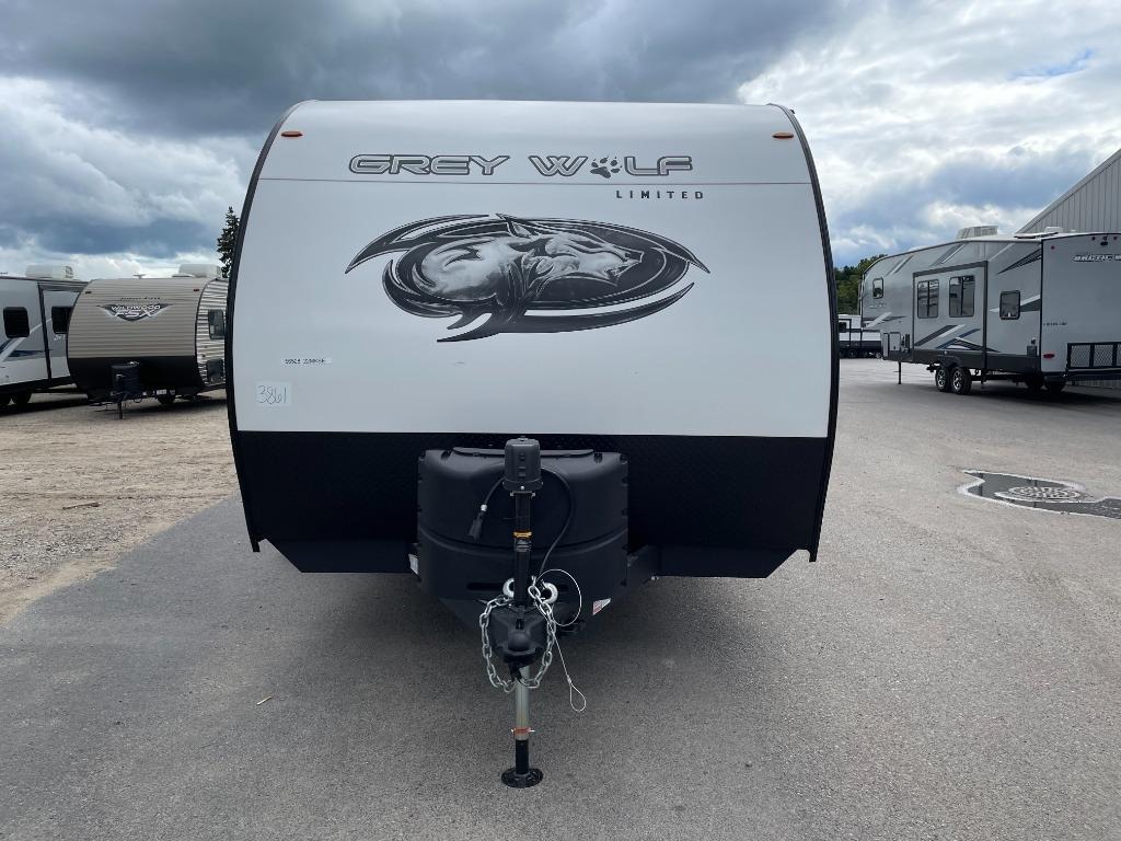 front of Grey Wolf travel trailer