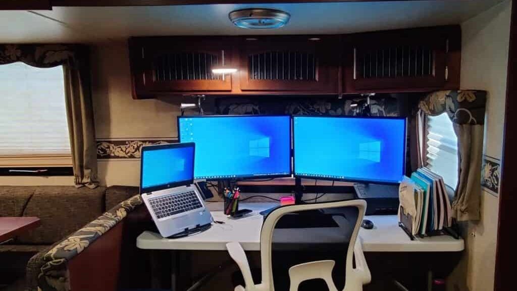 office in RV with 3 monitors