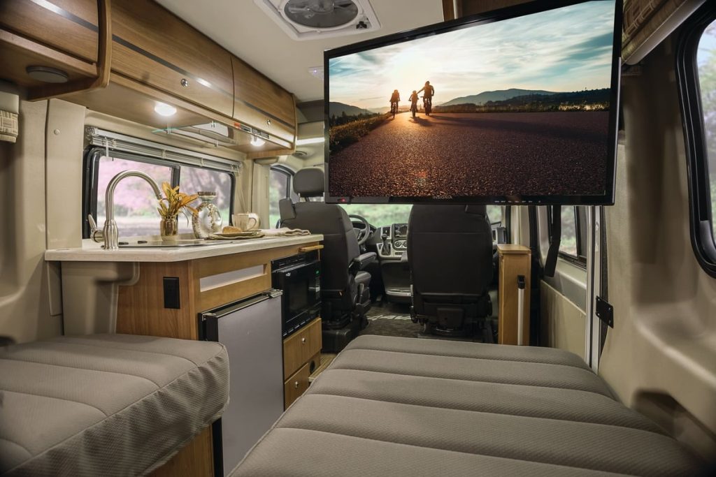 living area in camper van with TV